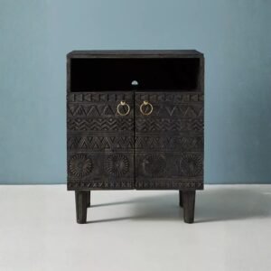 Handcrafted mango wood bedside cabinet with tribal carved design and antique brass handles