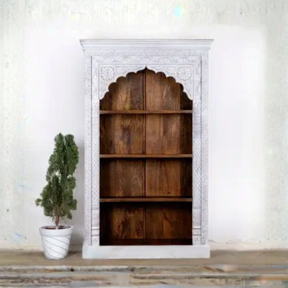 Handcrafted whitewashed jharokha carved wooden bookrack and display cabinet with traditional Indian arch design