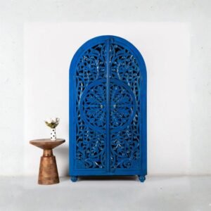 Royal blue hand-carved wooden wardrobe cabinet with arched doors – front view.