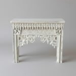 Hand carved distressed white mango wood console table with ornate traditional Indian carving