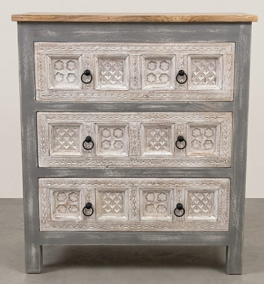Hand carved wooden chest of drawers with distressed grey finish and decorative carved drawer panels