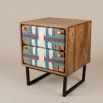 Handcrafted wooden nightstand with handwoven jute drawer fronts in geometric teal and natural pattern