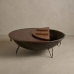 round rustic center table with hidden storage and metal legs