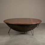 round rustic center table with hidden storage and metal legs