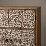 vintage finish storage cabinet with double doors and detailed carvings