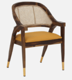 Walnut finish wooden dining chair with cane back and upholstered seat with brass legs