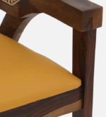 Walnut finish wooden dining chair with cane back and upholstered seat with brass legs