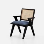 Solid wood dining chair with cane backrest and upholstered seat in black finish