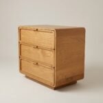 Minimalist solid wood 3-drawer chest cabinet with rounded edges and smooth channel drawers in natural wood finish