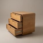 Minimalist solid wood 3-drawer chest cabinet with rounded edges and smooth channel drawers in natural wood finish