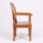 Premium teak wood dining chair with round cane back and natural finish