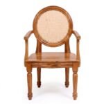 Premium teak wood dining chair with round cane back and natural finish